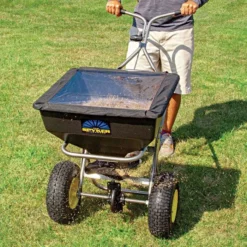 Spyker Ergo-Pro Spreader 80lb With Stainless Steel Frame 7 Spyker Ergo-Pro Spreader 80lb With Stainless Steel Frame -Garden Store spy80 1s inuse close
